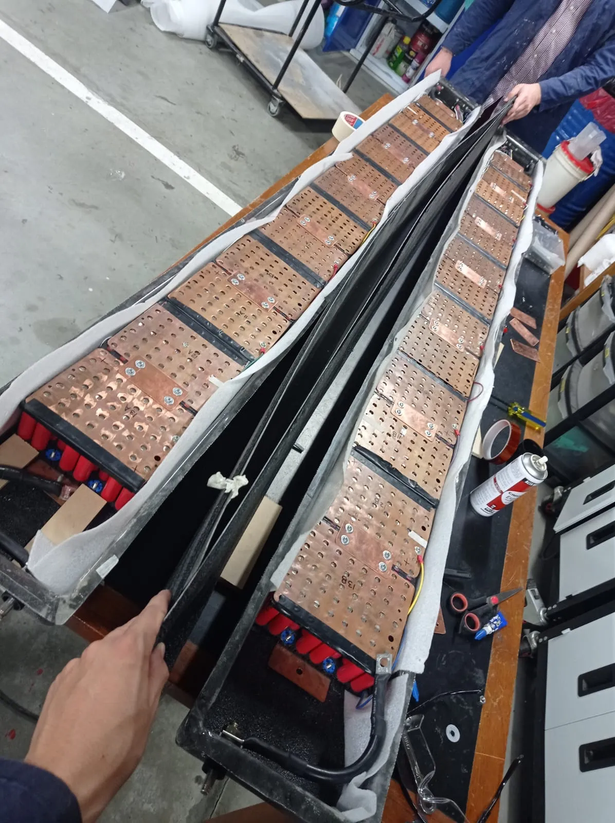 Pack installed in the vehicle along the chassis floor.
