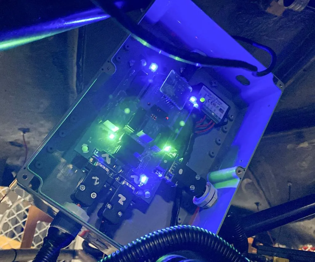 Charging assembly bench-tested against a J1772 EVSE before vehicle integration.